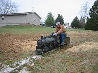  John T. at the throttle of his freshly shopped Atlantic out on the mainline for the first time in a decade or more. Another man with a big smile!